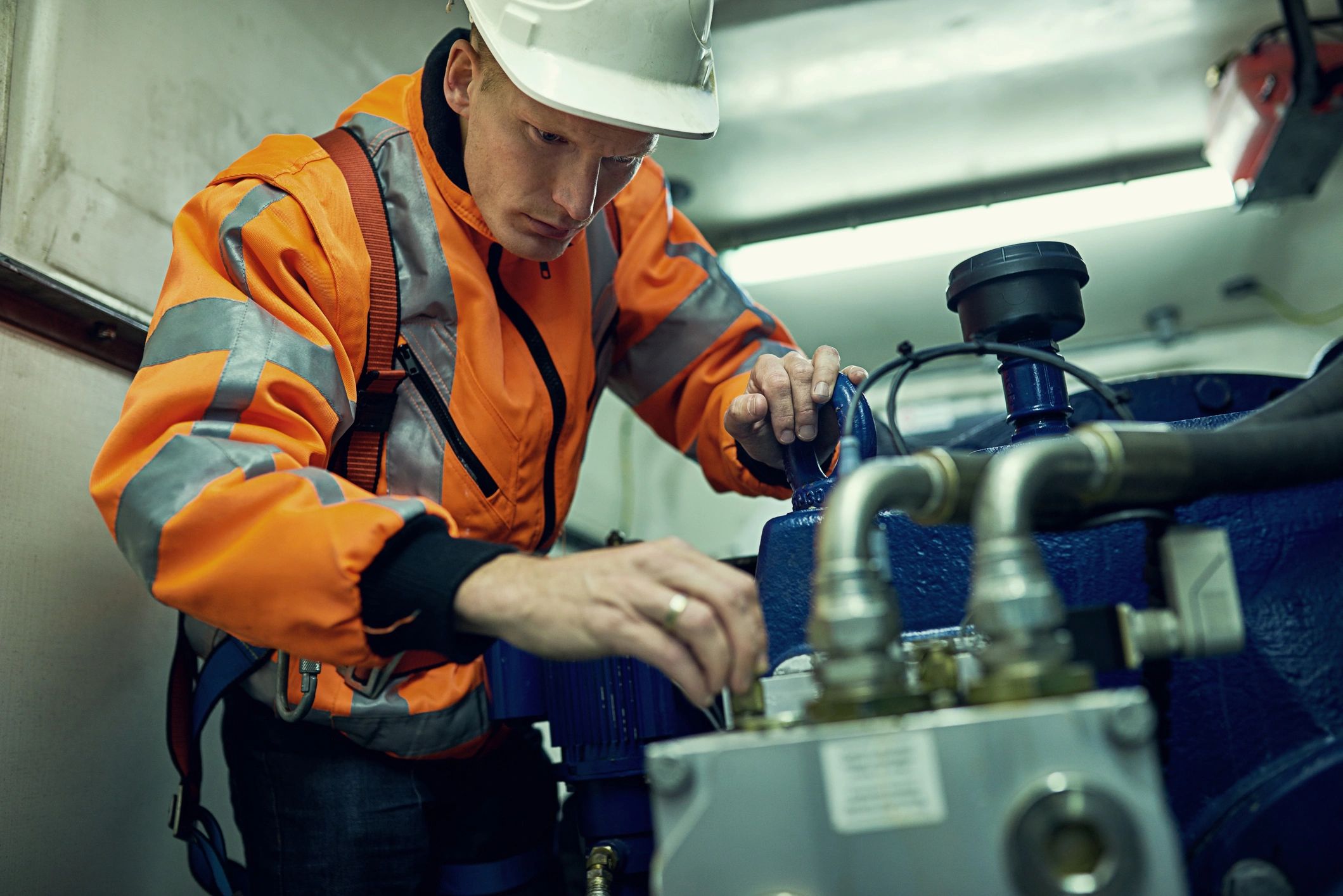 Engineer working with machinery
